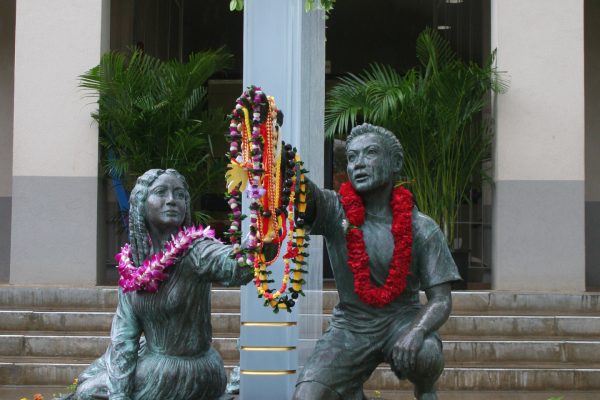 77” x 80” x 84” in bronze, clear cast acrylic and concrete
Across the Generations represents the past and present of Royal School as the passion for learning is passed from one generation to the next, from the young princess Bernice Pauahi in 1843 to the student of today. Spilling forth from the back of the book is a cornucopia of world knowledge and experience, a pathway to inspiration for the curious mind.
Commissioned by Hawai’i SFCA for Royal School in Honolulu, Hawai’i
Completed in 2004